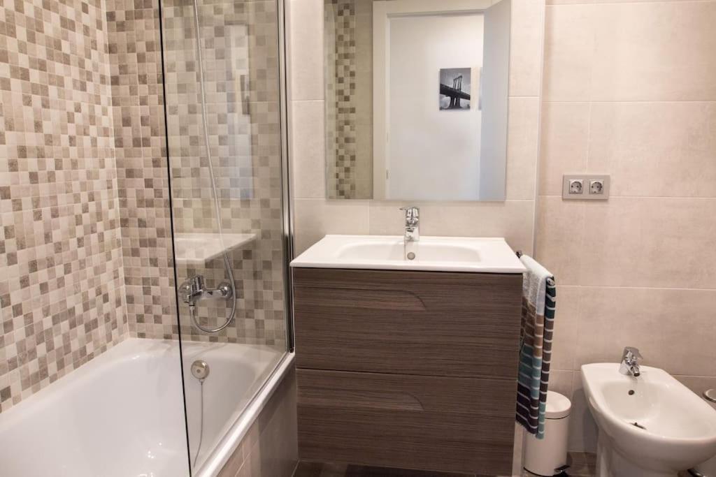 Seahomes Vacations - Seafront Fenals With Pkg Apartment